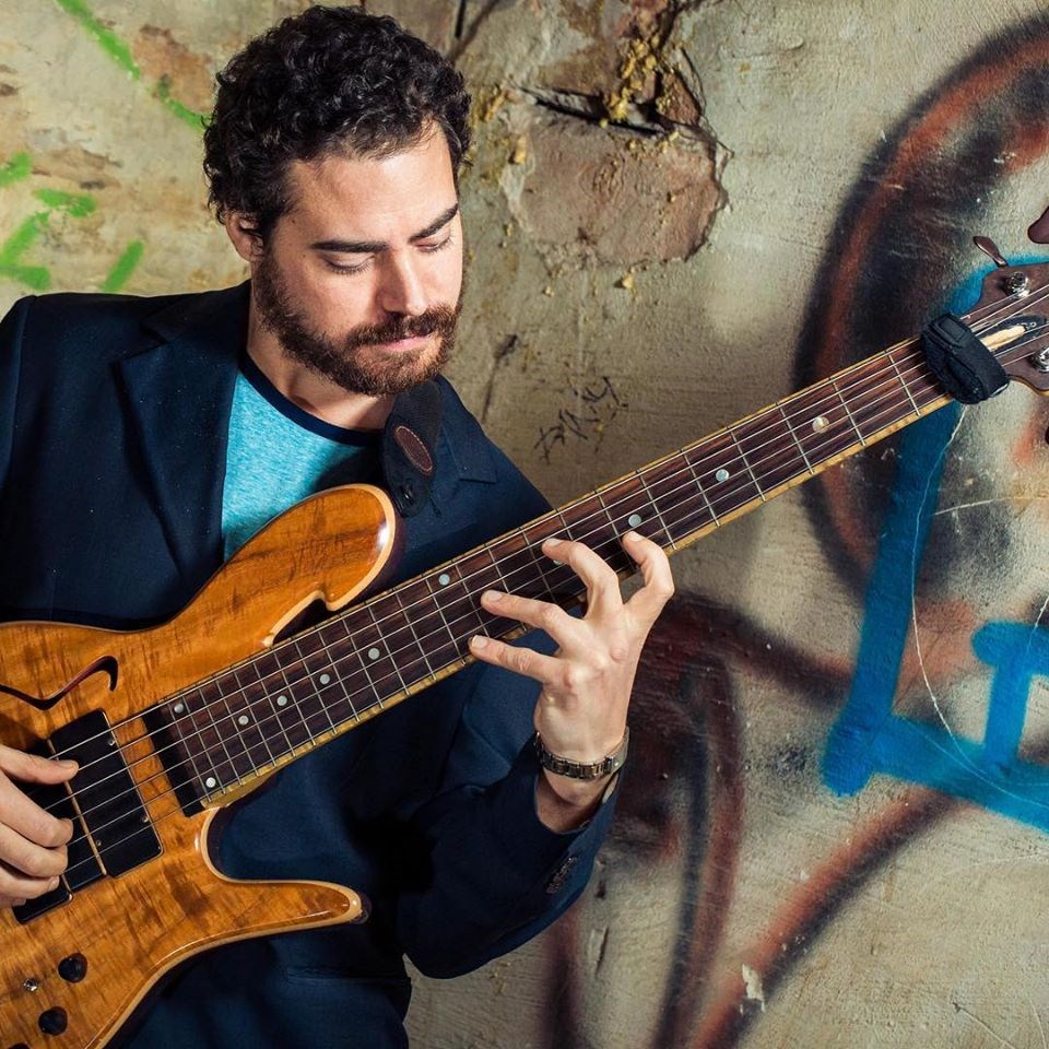 Roberto Badoglio playing bass guitar